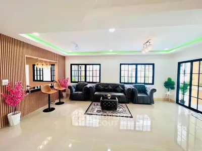 Spacious modern living room with elegant decor and stylish lighting