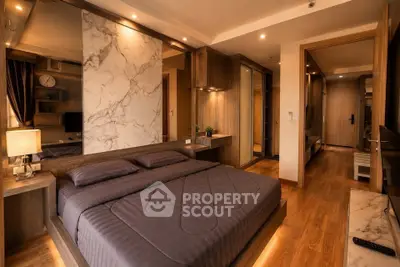 Luxurious modern bedroom with elegant wooden flooring and ambient lighting