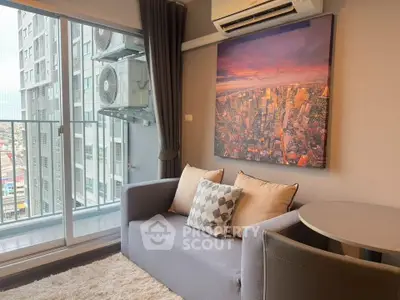 Modern living room with city view, cozy sofa, and stylish decor in a high-rise apartment.