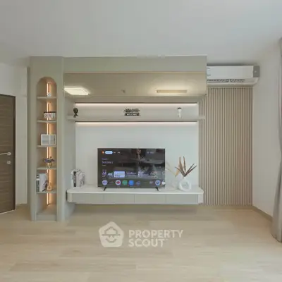 Modern living room with sleek TV unit and stylish decor