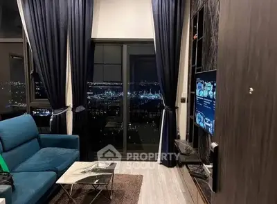 Luxurious living room with stunning night city view and modern decor