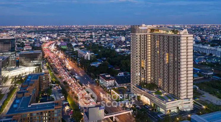 Stunning high-rise building with panoramic city views at dusk, ideal for urban living.