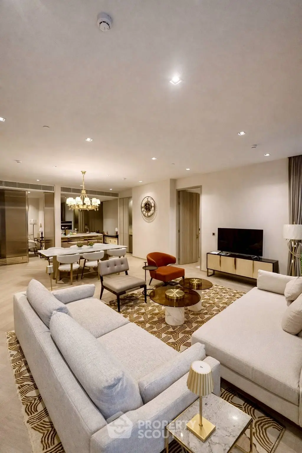 Luxurious living room with modern decor and elegant lighting