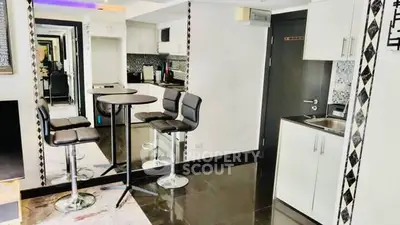 Modern kitchen with sleek design and stylish bar seating