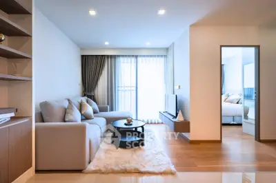 Modern living room with cozy sofa and elegant decor in a bright apartment
