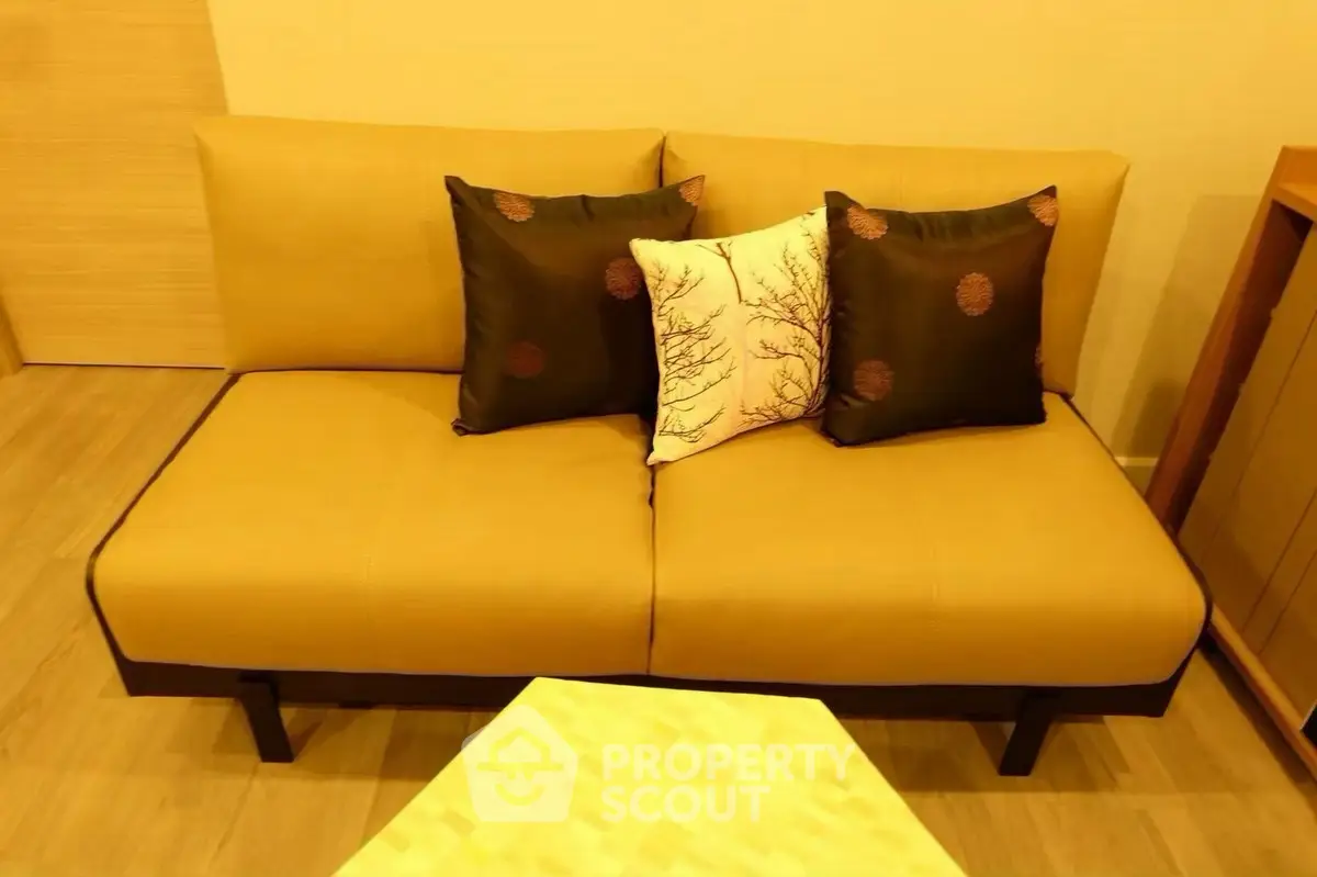 Cozy living room with stylish sofa and decorative pillows