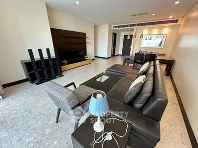 Spacious modern living room with sleek furniture and elegant decor