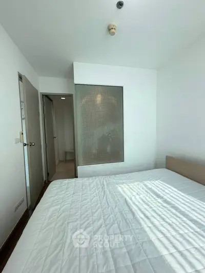 Bright bedroom with modern design and natural light