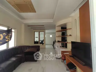 Spacious living room with modern decor and large sectional sofa