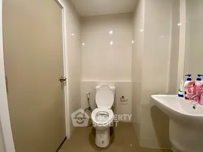 Modern bathroom with sleek fixtures and neutral tones