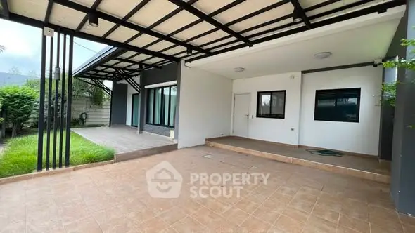 Spacious covered patio with modern design and tiled flooring
