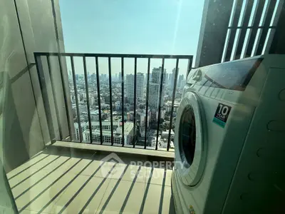 High-rise balcony with city view and washing machine, perfect for urban living.