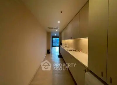 Sleek modern kitchen with ample storage and minimalist design, perfect for urban living.