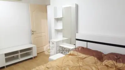 Modern bedroom with stylish furniture and neutral decor