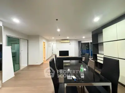 Spacious modern living room with sleek dining area and stylish decor