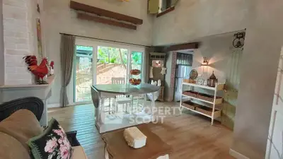 Charming rustic living room with high ceilings and natural light