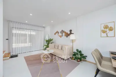 Modern living room with elegant decor, featuring a cozy sofa, stylish rug, and contemporary wall art.