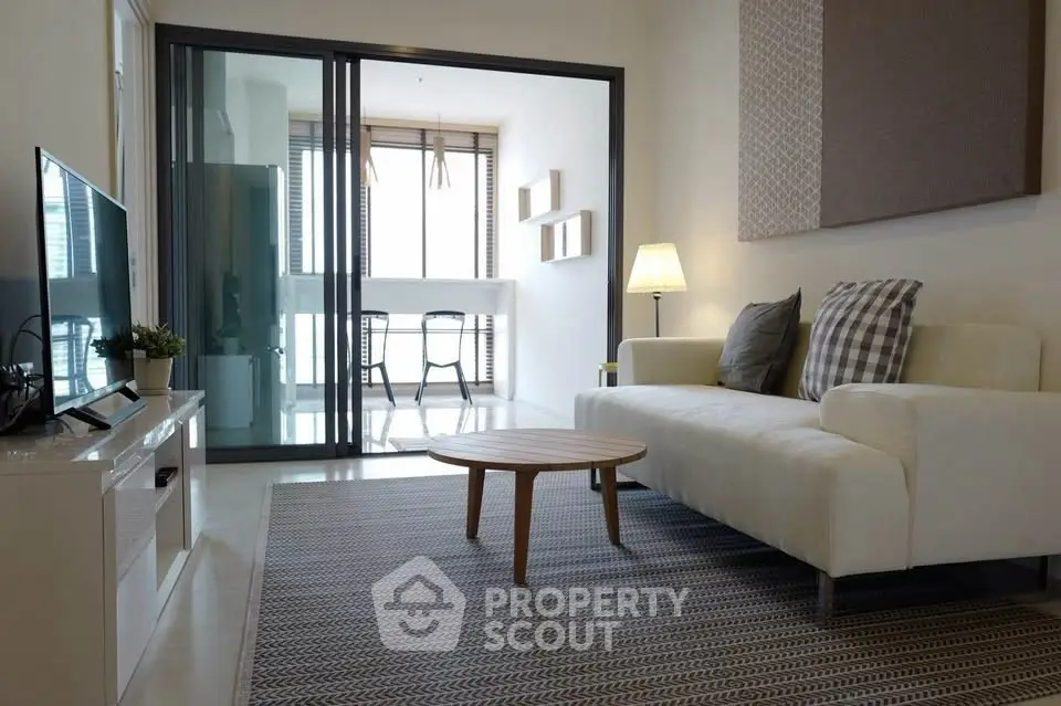 Modern living room with stylish decor and natural light