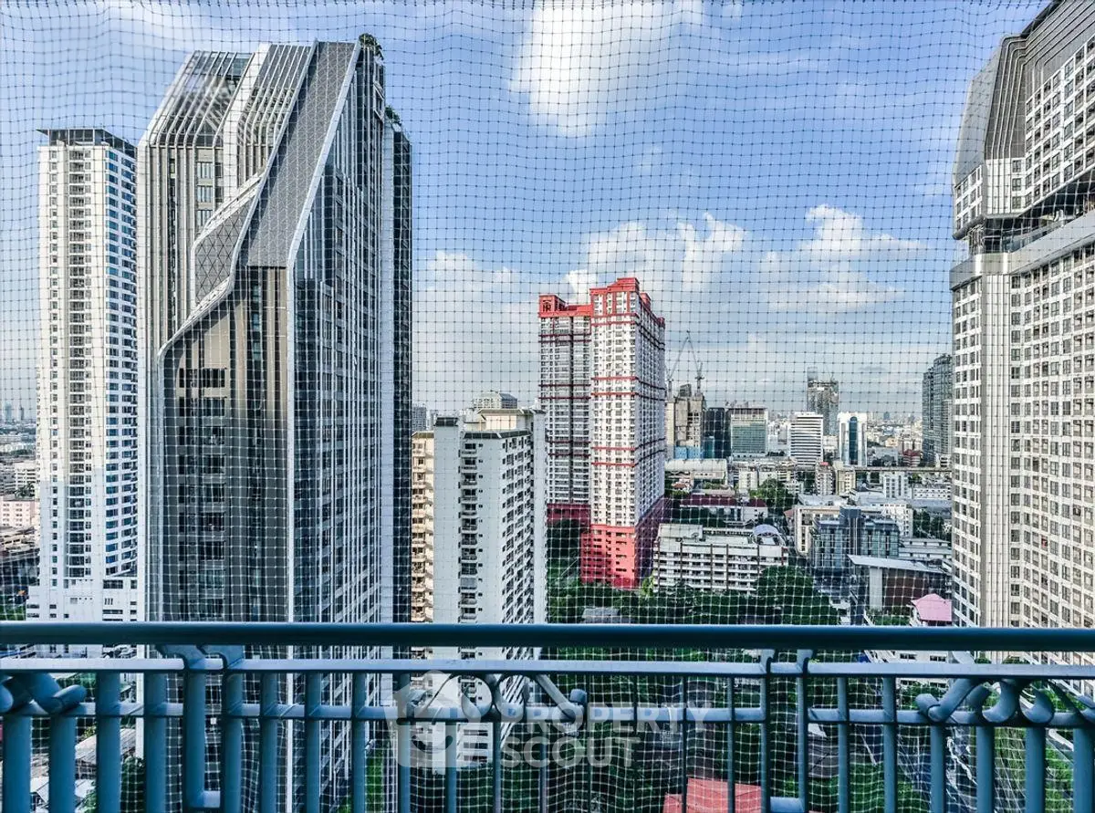 Stunning cityscape view from high-rise balcony with modern architecture