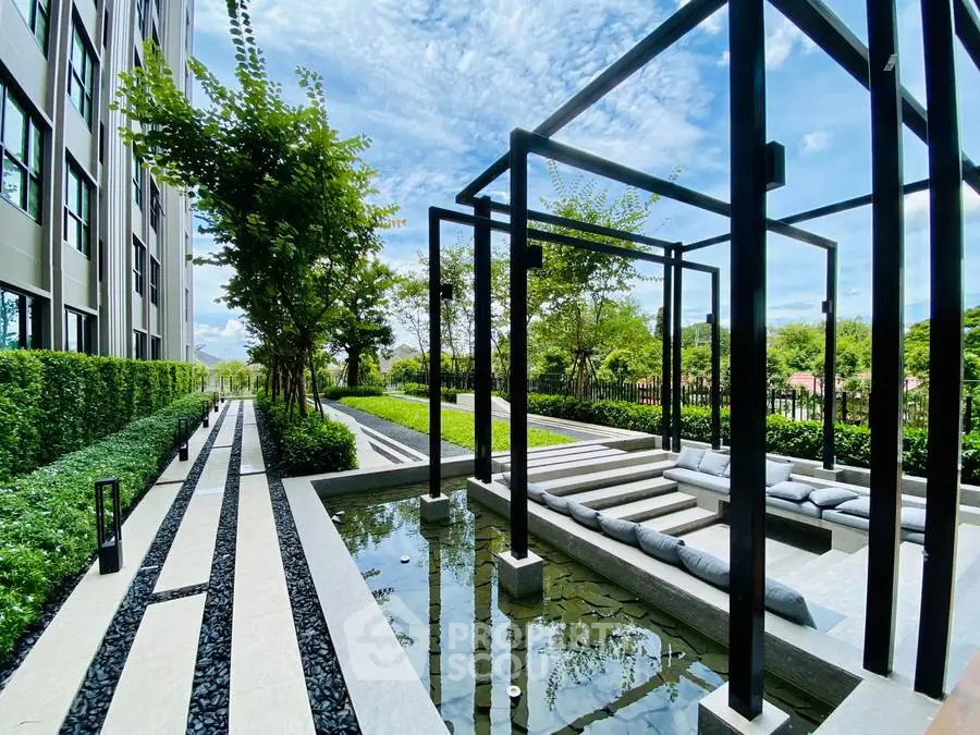 Luxurious modern garden with sleek water feature and pergola, perfect for relaxation.