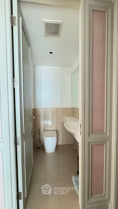 Modern minimalist bathroom with sleek fixtures and neutral tones