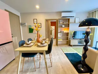 Modern living room with stylish dining area and contemporary decor