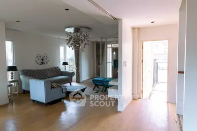 Spacious living room with elegant decor and natural light