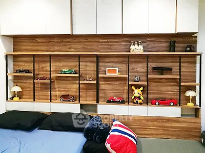 Stylish bedroom with modern wooden shelving and decorative accents