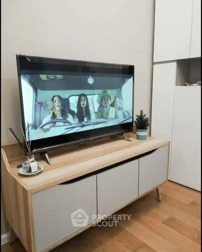 Modern living room with sleek TV stand and stylish decor