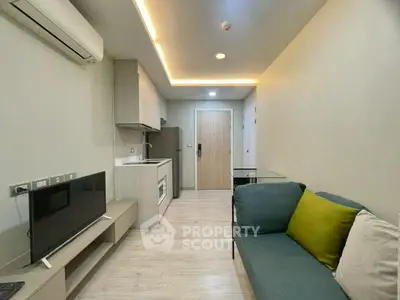 Modern compact living room with integrated kitchen and stylish decor