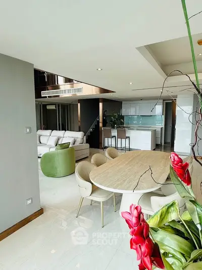 Luxurious open-plan living room with modern furniture and elegant decor