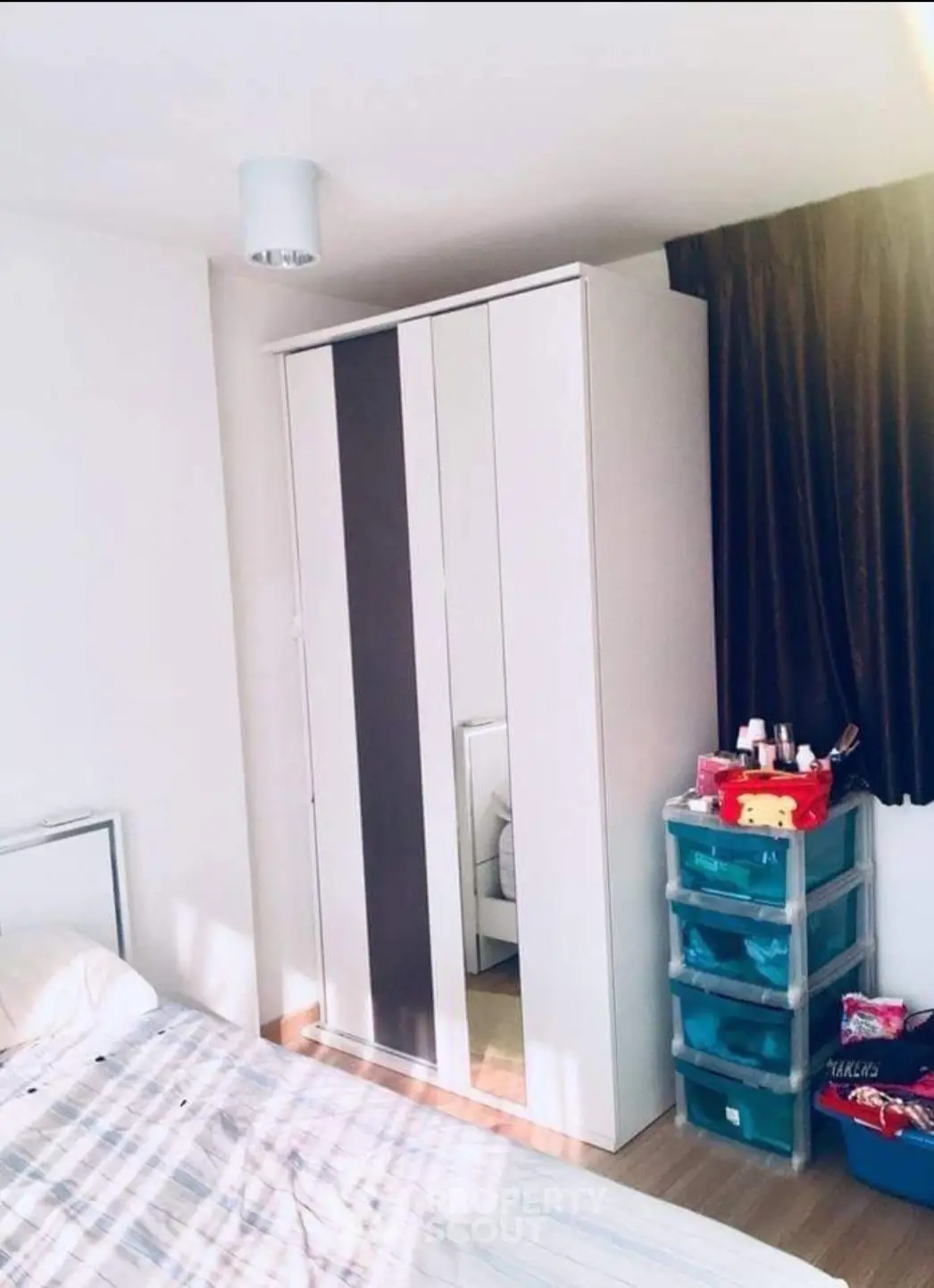 Cozy bedroom with modern wardrobe and ample storage space