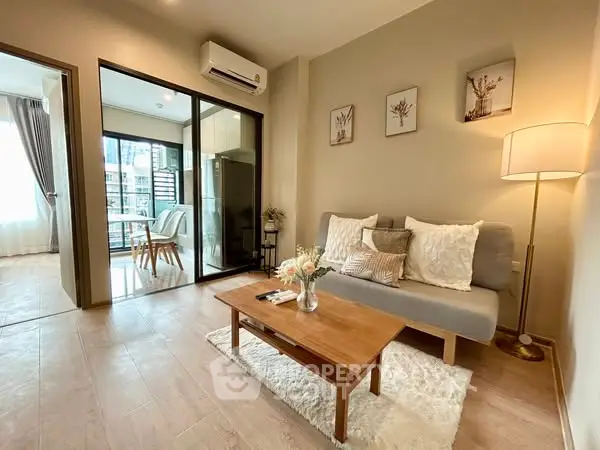 Modern living room with cozy decor and natural light