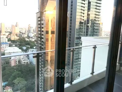 Stunning high-rise balcony view with cityscape and modern architecture.