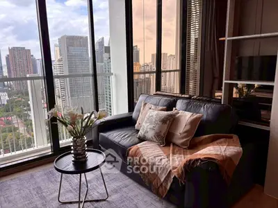 Luxurious living room with stunning city view and elegant decor in high-rise apartment.