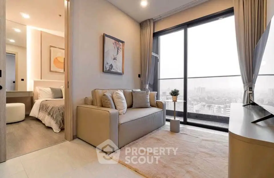 Modern living room with city view and cozy bedroom in luxury apartment