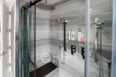 Modern bathroom with sleek shower design and elegant fixtures