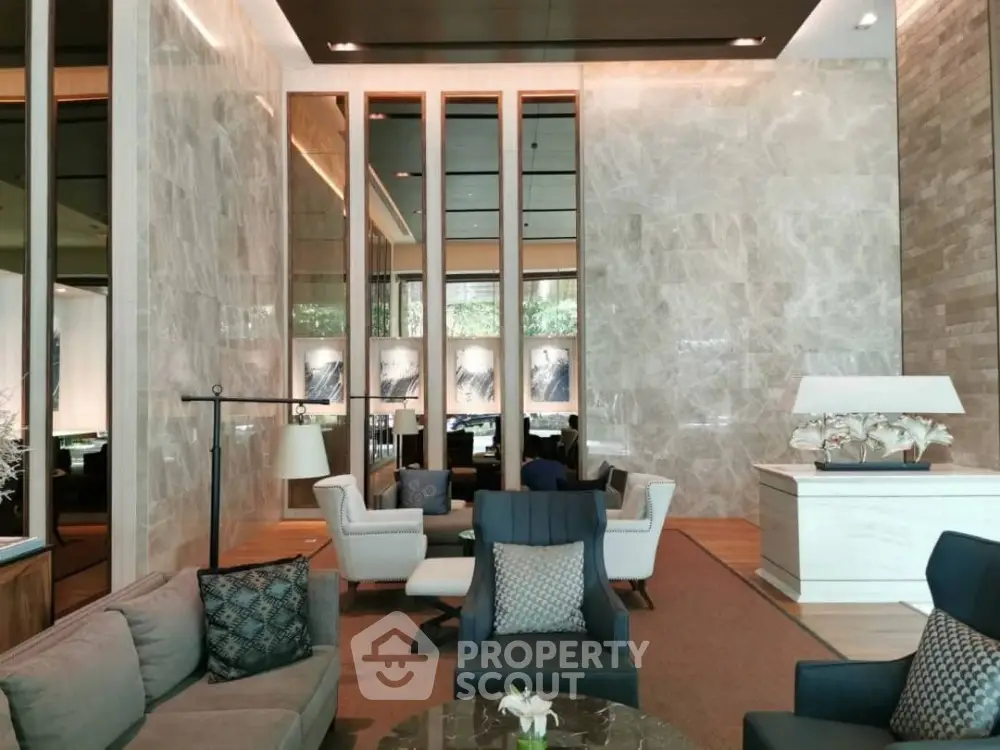 Luxurious modern living room with elegant decor and stylish furniture in a high-end property.