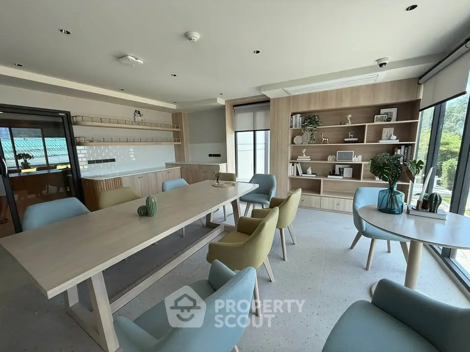 Spacious modern living room with elegant furniture and natural light