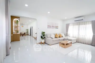 Spacious modern living room with elegant decor and natural light