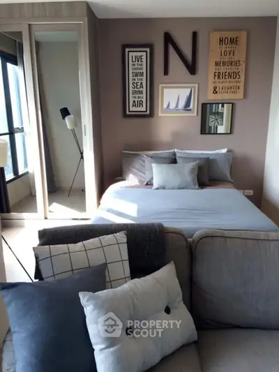 Cozy bedroom with stylish decor and natural light