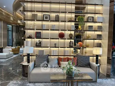 Luxurious modern living room with elegant decor and stylish shelving unit.