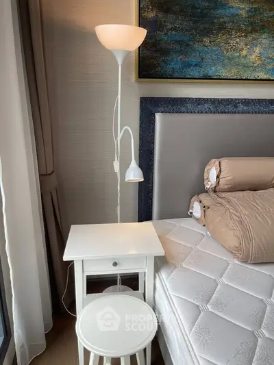 Cozy bedroom corner with modern lamp and stylish decor