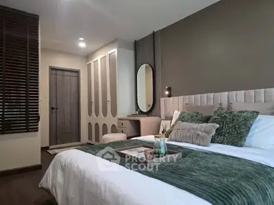 Luxurious bedroom with elegant decor and plush bedding in modern apartment