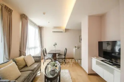 Spacious modern living room with elegant decor and natural light