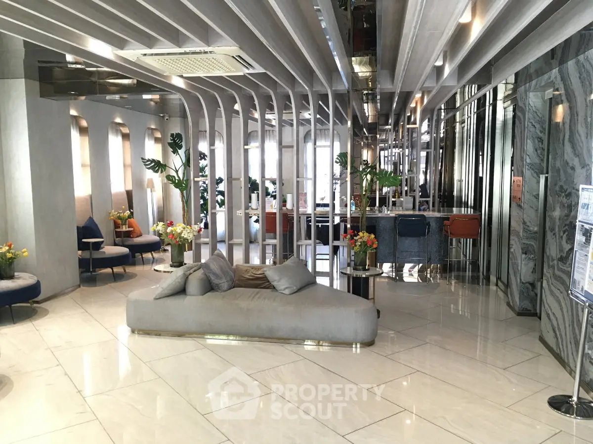 Luxurious modern lobby with sleek design and elegant seating area