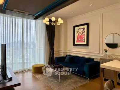 Elegant living room with modern decor and large window view