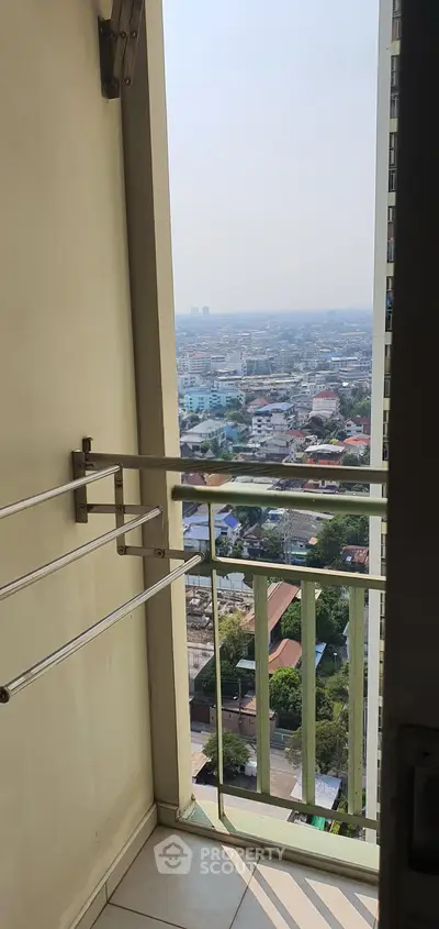 High-rise balcony with stunning cityscape view, perfect for urban living enthusiasts.