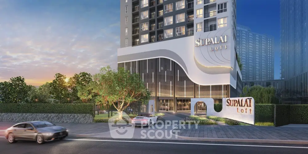 Modern high-rise building exterior with sleek design and lush landscaping