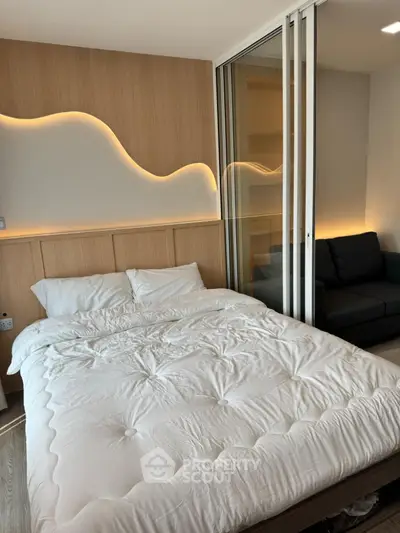 Modern bedroom with stylish lighting and cozy ambiance